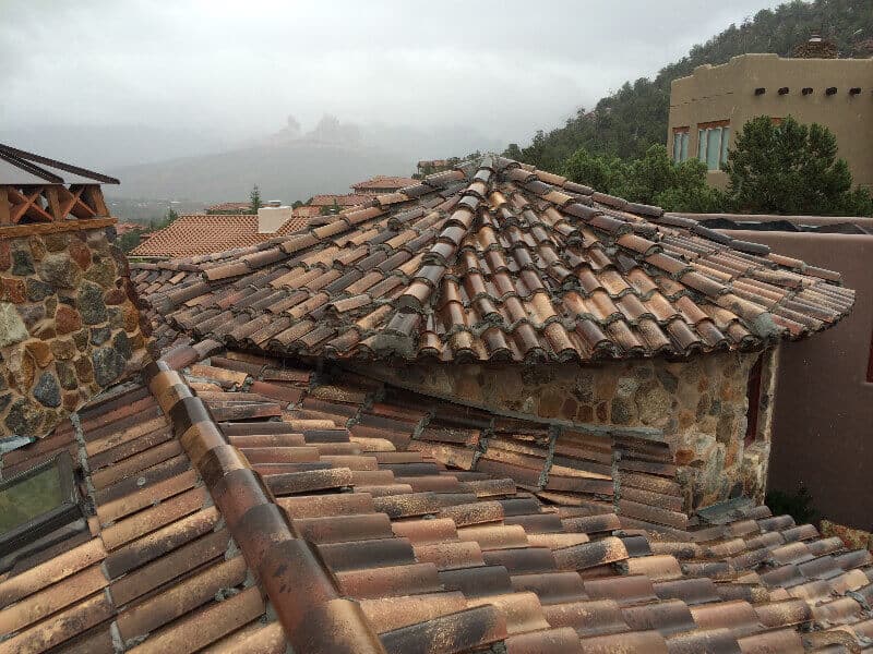 tile roof on a turret of a stone house