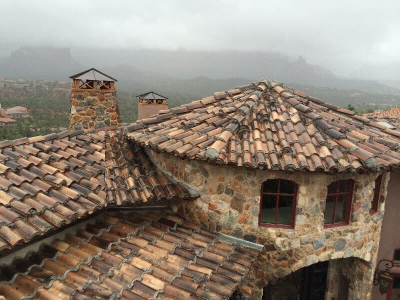 tile roof on a turret of a stone house