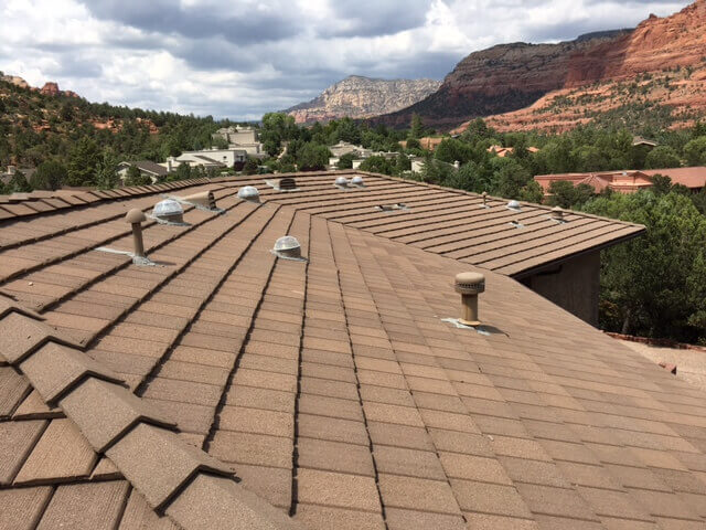 Tile Roofing on a house with many vents