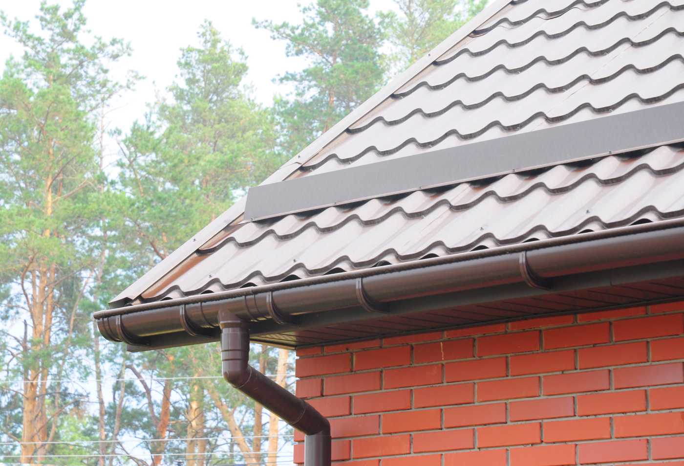 Factors to Consider When Choosing Gutter Guards for Metal Roofs