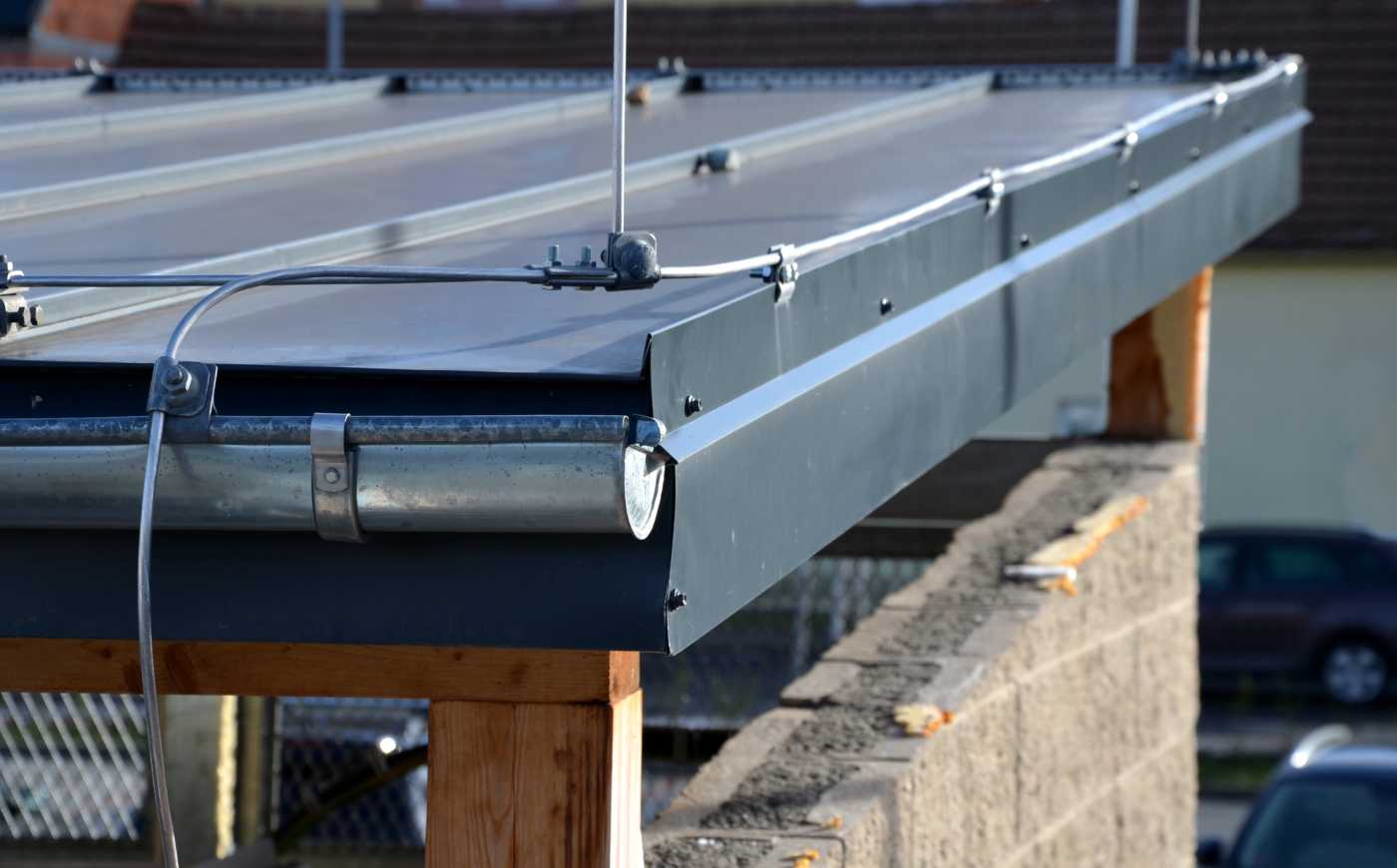 Types of Gutter Guards for Metal Roofs