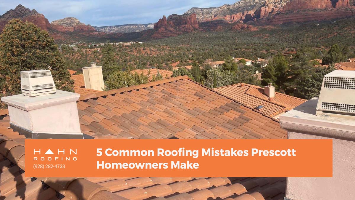 Terracotta tile roof with chimneys against Sedona's iconic red rock backdrop, showcasing roofing in Northern Arizona. Image for blog post "5 Common Roofing Mistakes Prescott Homeowners Make" by Hahn Roofing.