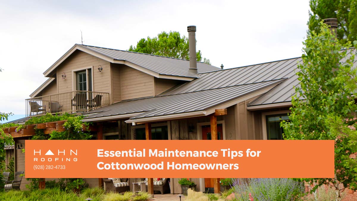 A charming Cottonwood home with a metal roof, surrounded by vibrant landscaping. Highlighting Hahn Roofing's "Essential Maintenance Tips for Cottonwood Homeowners."